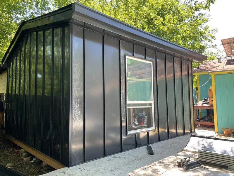 Black standing seam metal wall panels for Metal Roof Installation in Redwood Falls