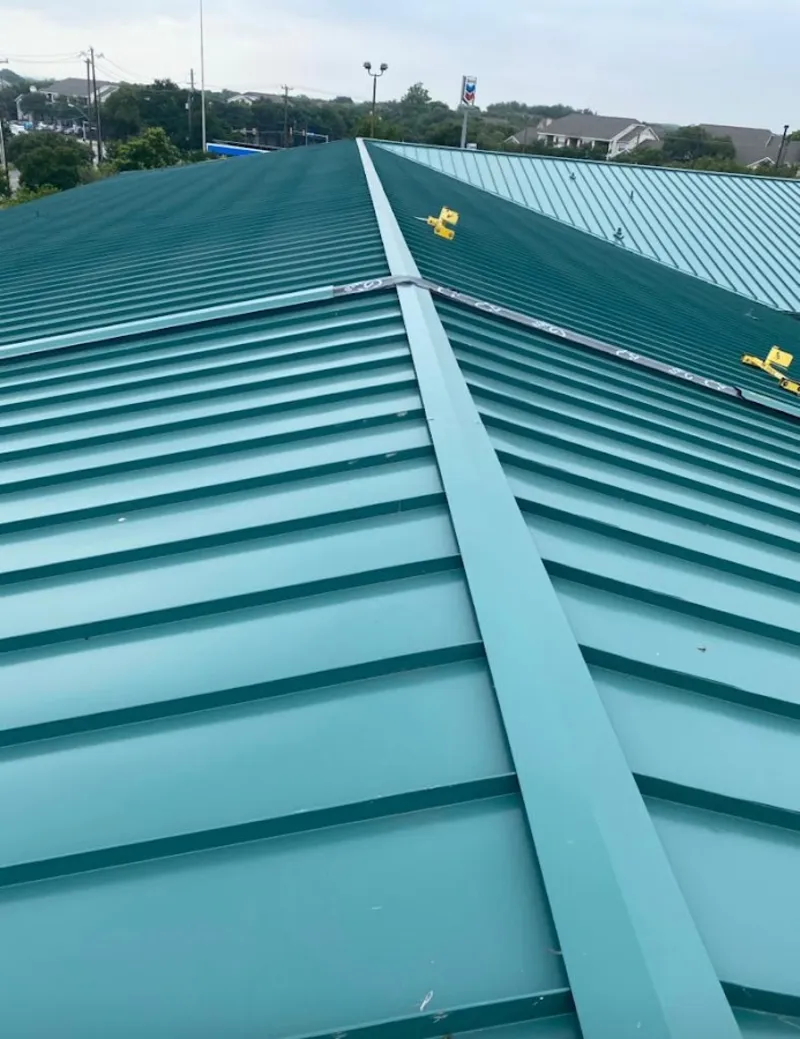 Green commercial metal roof ridge and valley for Metal Roof Repair in Redwood Falls